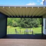 aluminiowa pergola tkaninowa, sterowana za pomocą pilota