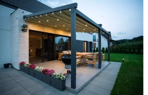 Pergola Premium, pergola tarasowa z aluminium z tkaninowym zadaszeniem, sterowana elektrycznie, oświetlenie punktowe